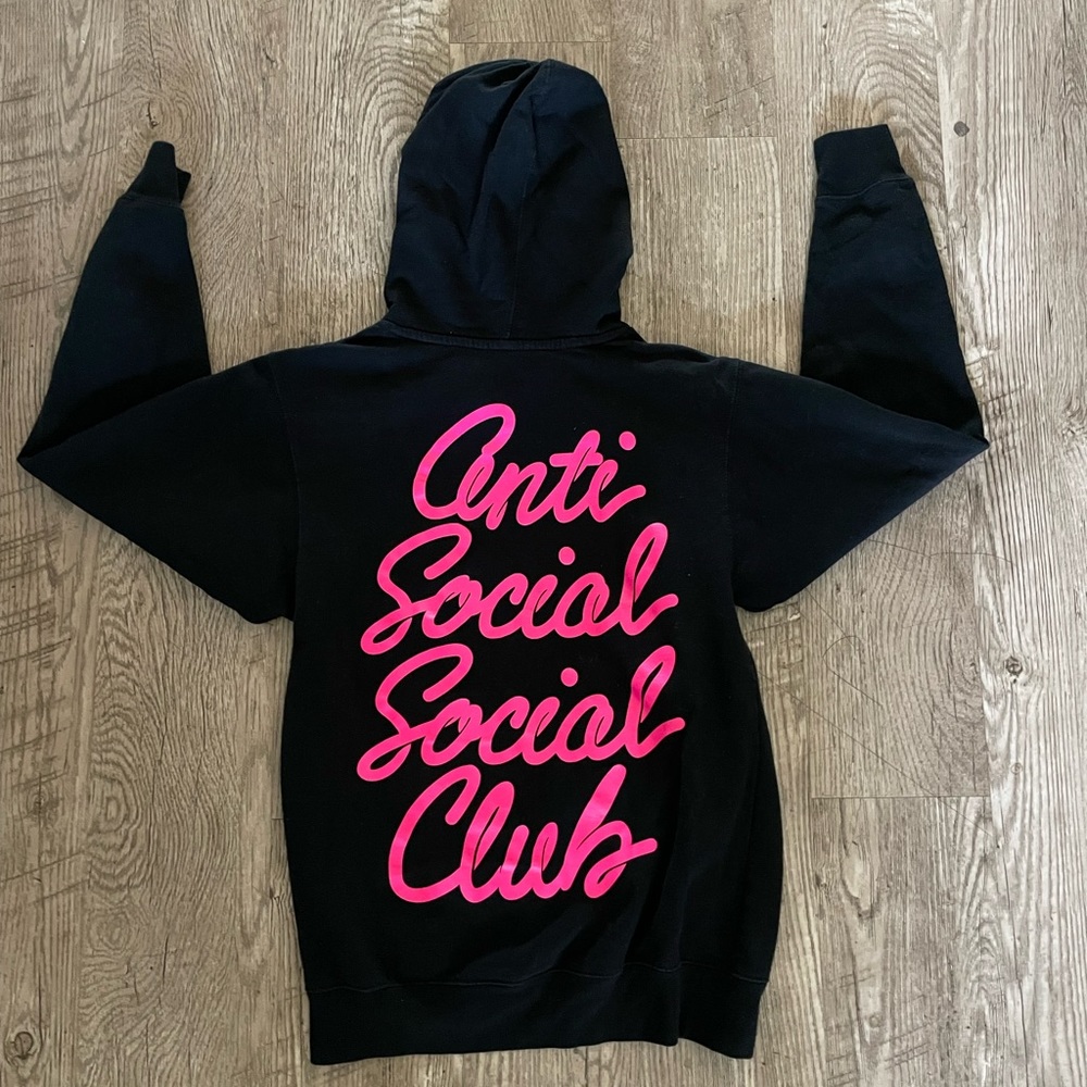 Black Anti Social Social Club hoodie with pink lettering slightly used